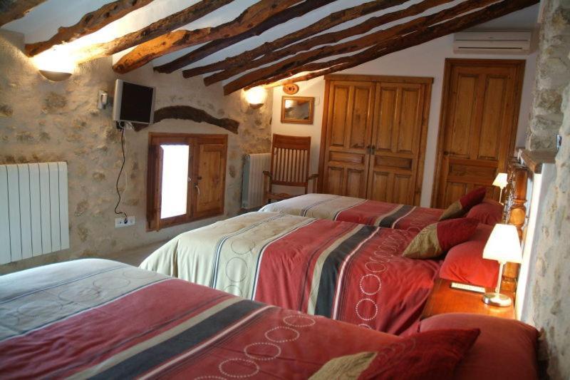 Hostal La Llar D'aitana Alcoleja Habitación foto